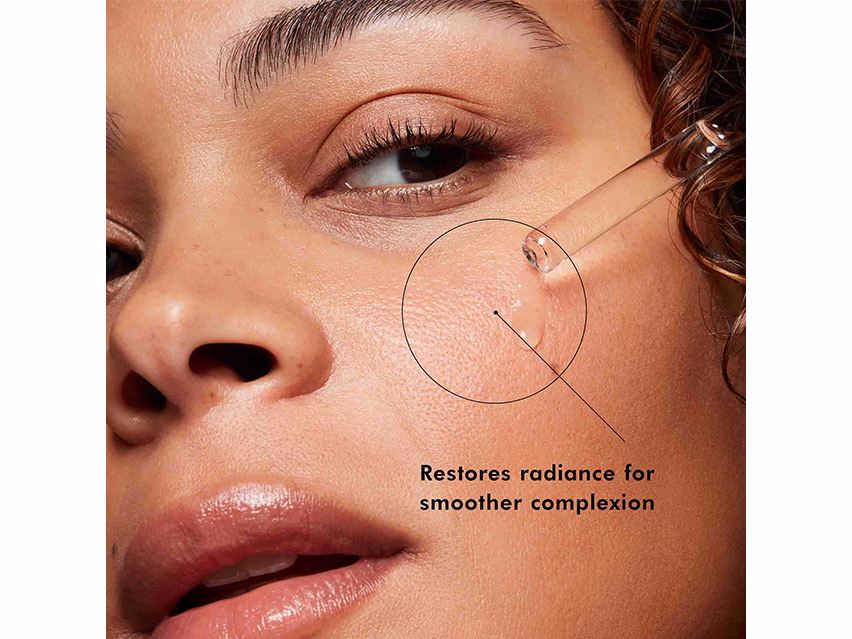 Woman applying SkinCeuticals Hydrating B5 Hyaluronic Acid Gel Serum